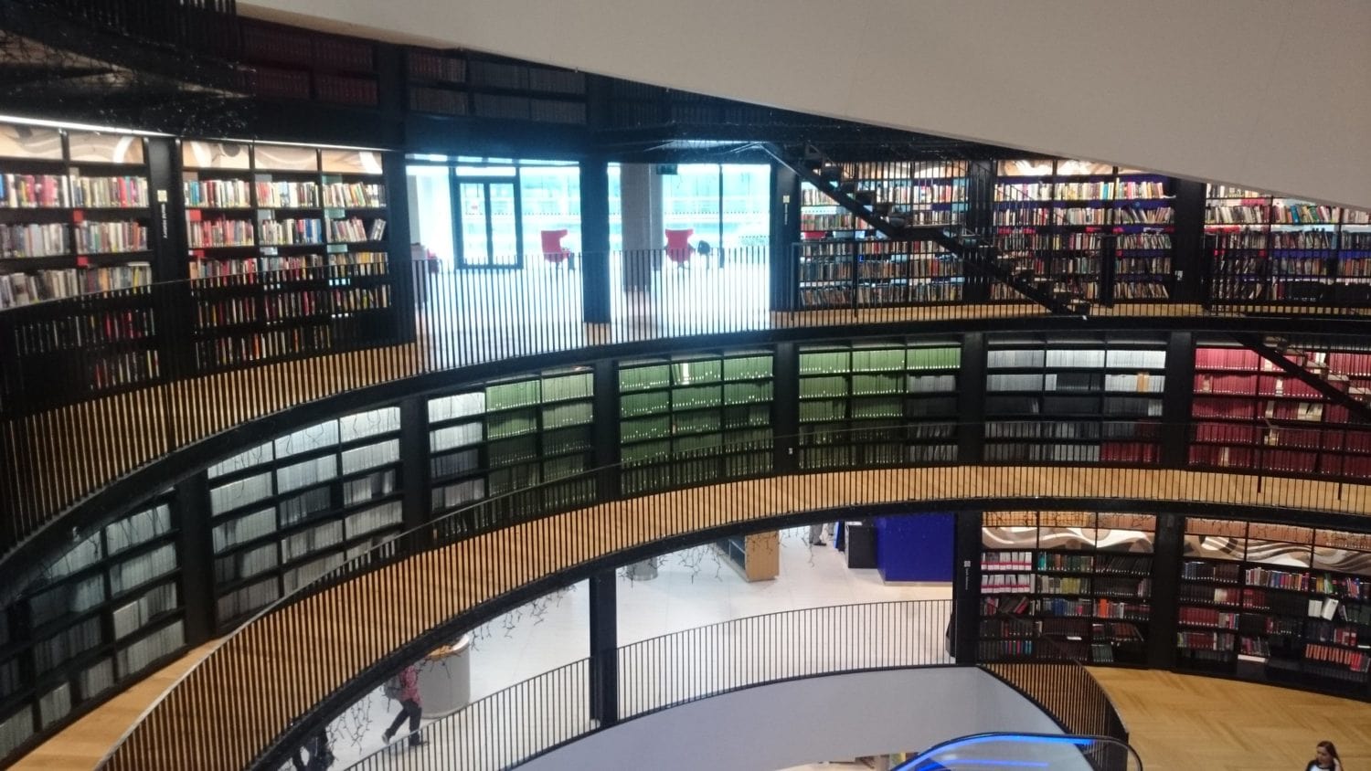 Interior walkways of Birmingham Library lined with books